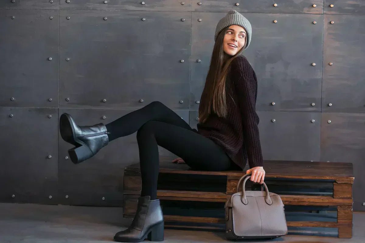 ragazza indossa leggings e maglione oversize