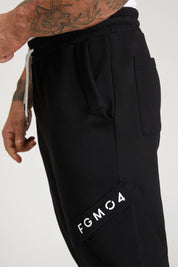 Pantaloni della tuta sportivi in cotone con tasconi laterali Pantalone Cargo FW 24/25 Nero - FGM04 - Linea Ikonic Uomo - fgm04