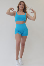 Top sportivo con spalline larghe gym fashion azzurro hawaiian
