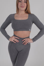 Maglia sportiva cropped seamless mélange con maniche lunghe