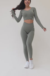 Maglia sportiva cropped seamless mélange con maniche lunghe