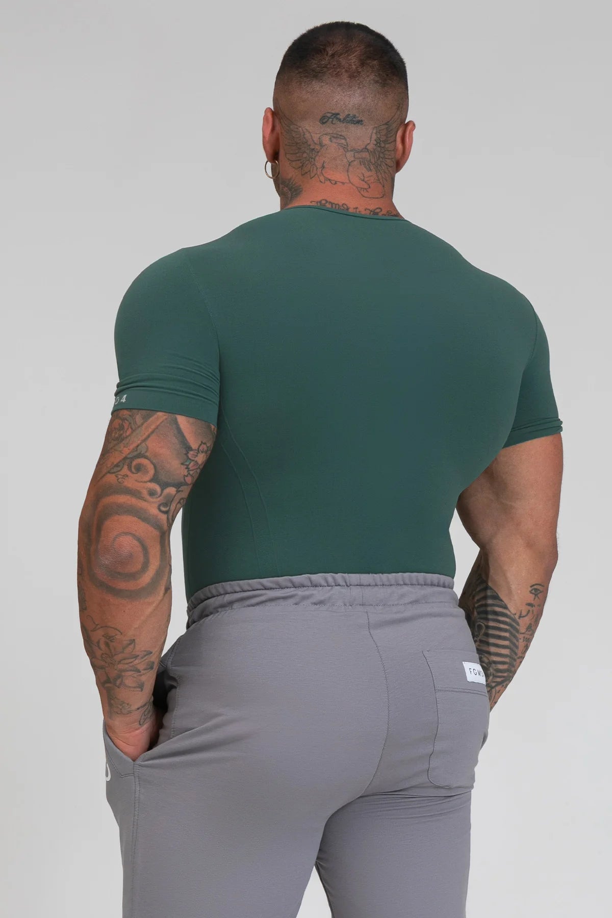 Maglia sportiva tecnica uomo Manica corta con tecnologia FIR Ikonic Sport Unisex Verde Pino - FGM04 - Linea Ikonic Uomo - fgm04