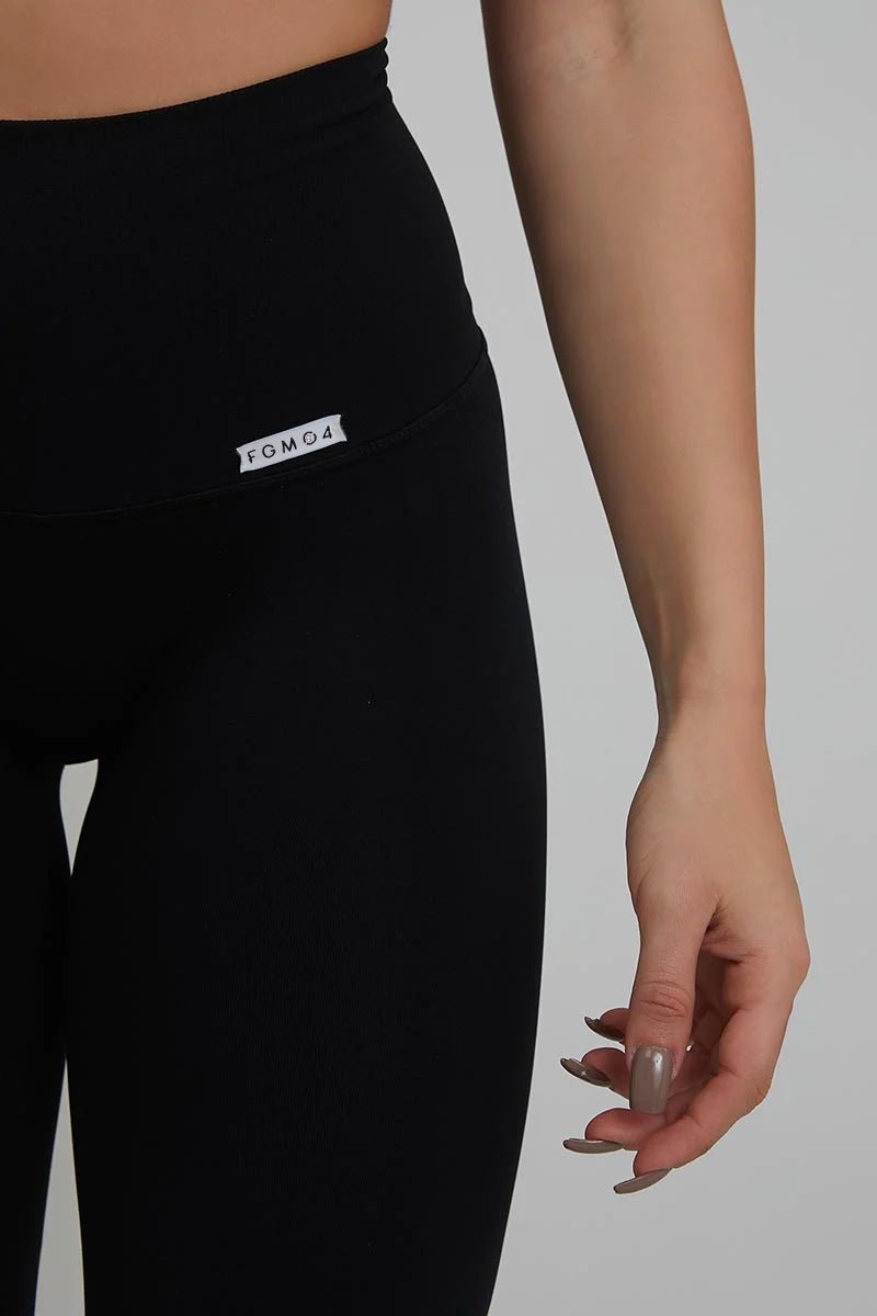 Leggings sportivi con tecnologia FIR push up con arricciatura a Zampa di Elefante Nero - FGM04 - LEGGINGS ANTICELLULITE - fgm04