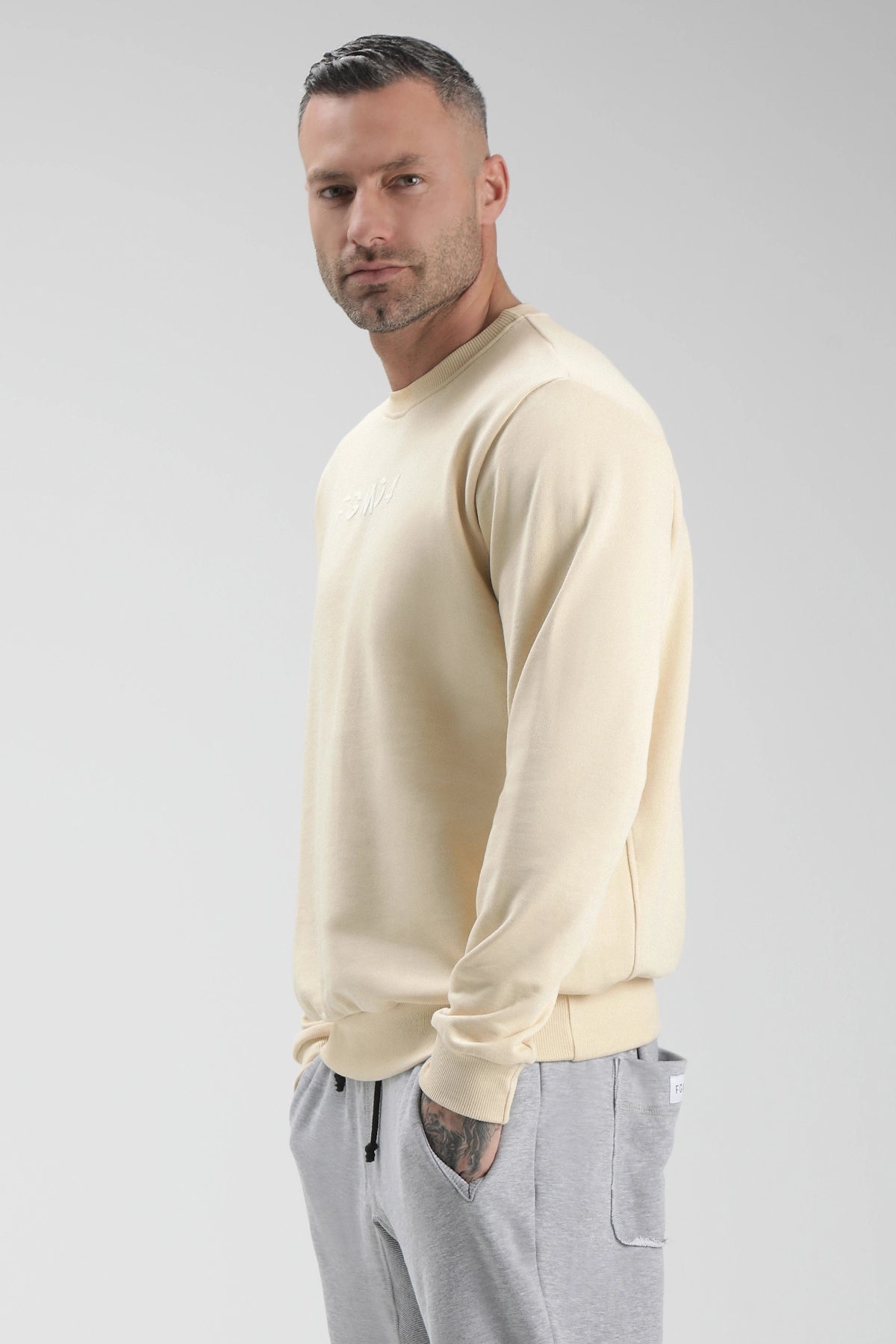 tuta sportiva in cotone oversize Felpa Over Ikonic SS24 Burro Uomo - FGM04 - Linea Ikonic Uomo - fgm04