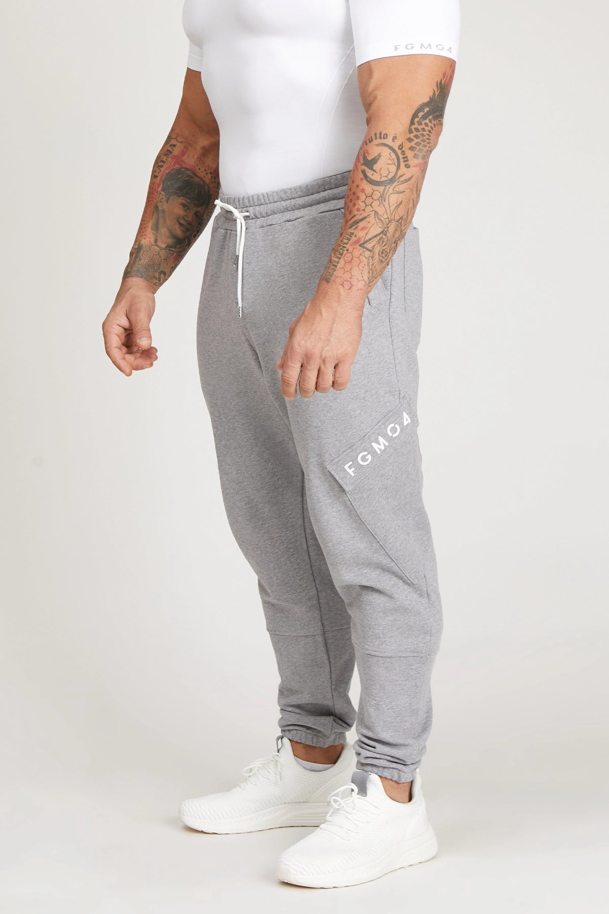 Pantaloni della tuta sportivi in cotone con tasconi laterali Pantalone Cargo FW 24/25 Grigio Chiaro Melange - FGM04 - Linea Ikonic Uomo - fgm04