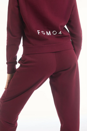 Felpa Ikonic Active Zip FW 25 Prugna