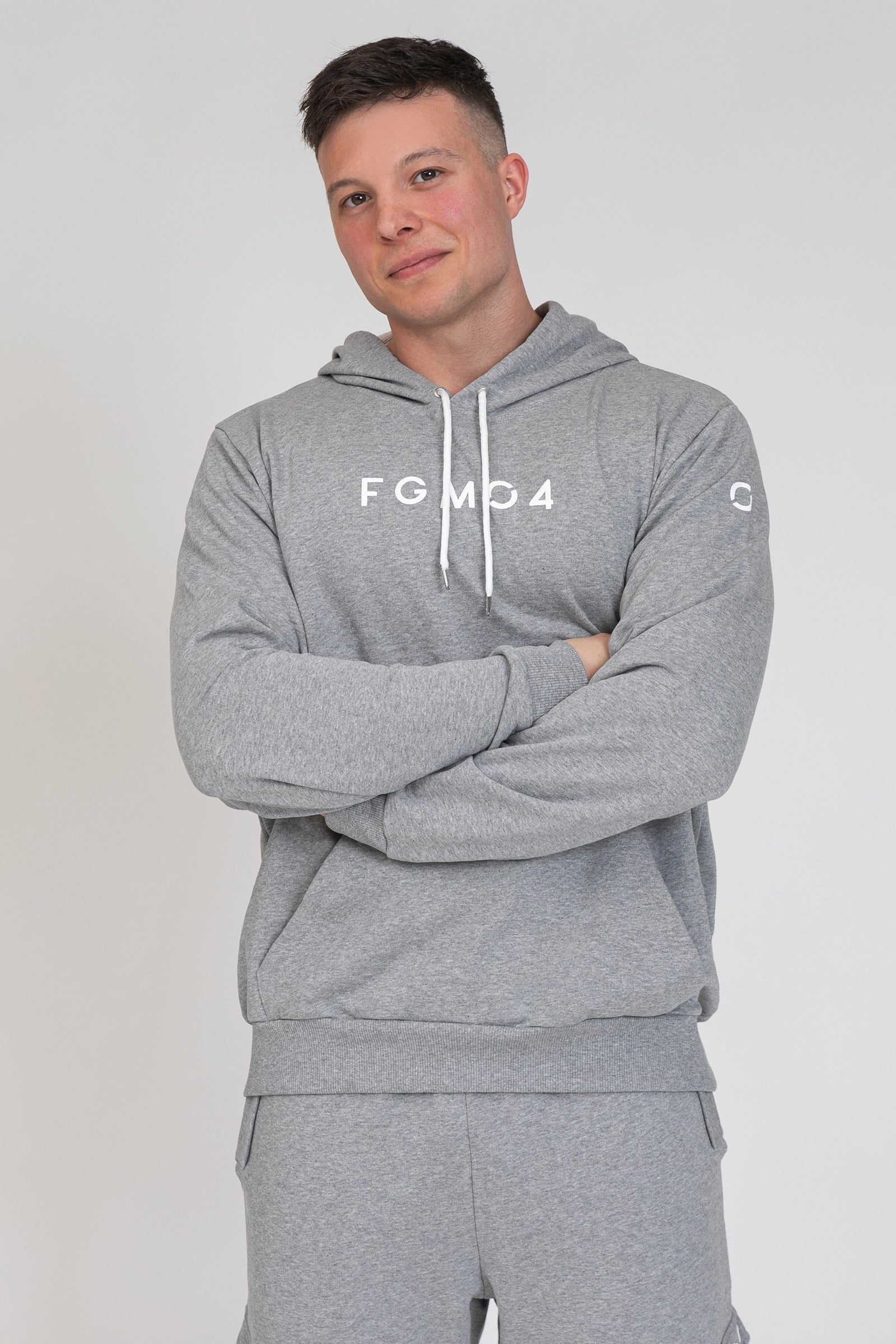 tuta sportiva in cotone oversize Felpa Over Con Cappuccio FW 24/25 Grigio Chiaro Melange Uomo - FGM04 - Linea Ikonic Uomo - fgm04