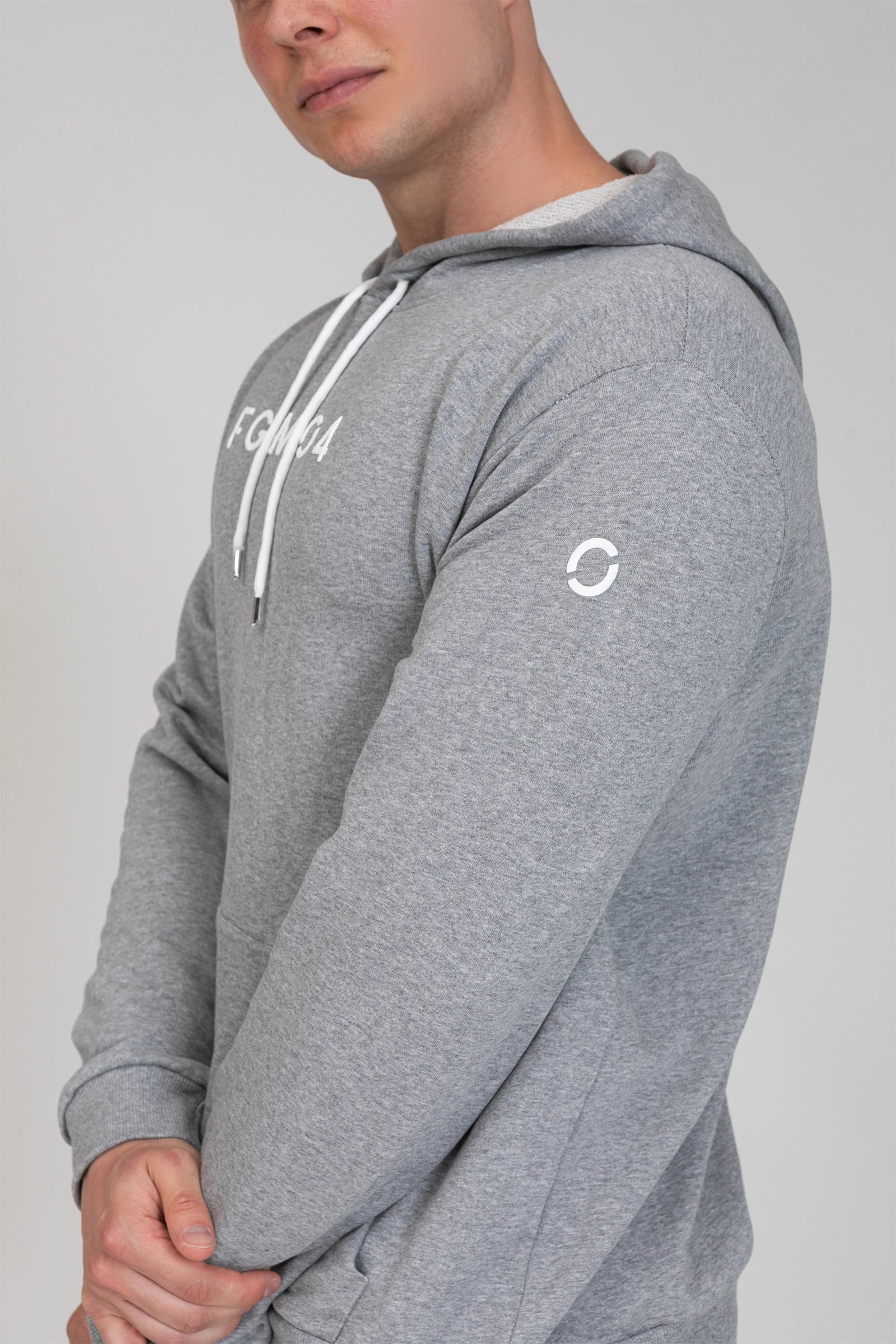 tuta sportiva in cotone oversize Felpa Over Con Cappuccio FW 24/25 Grigio Chiaro Melange Uomo - FGM04 - Linea Ikonic Uomo - fgm04