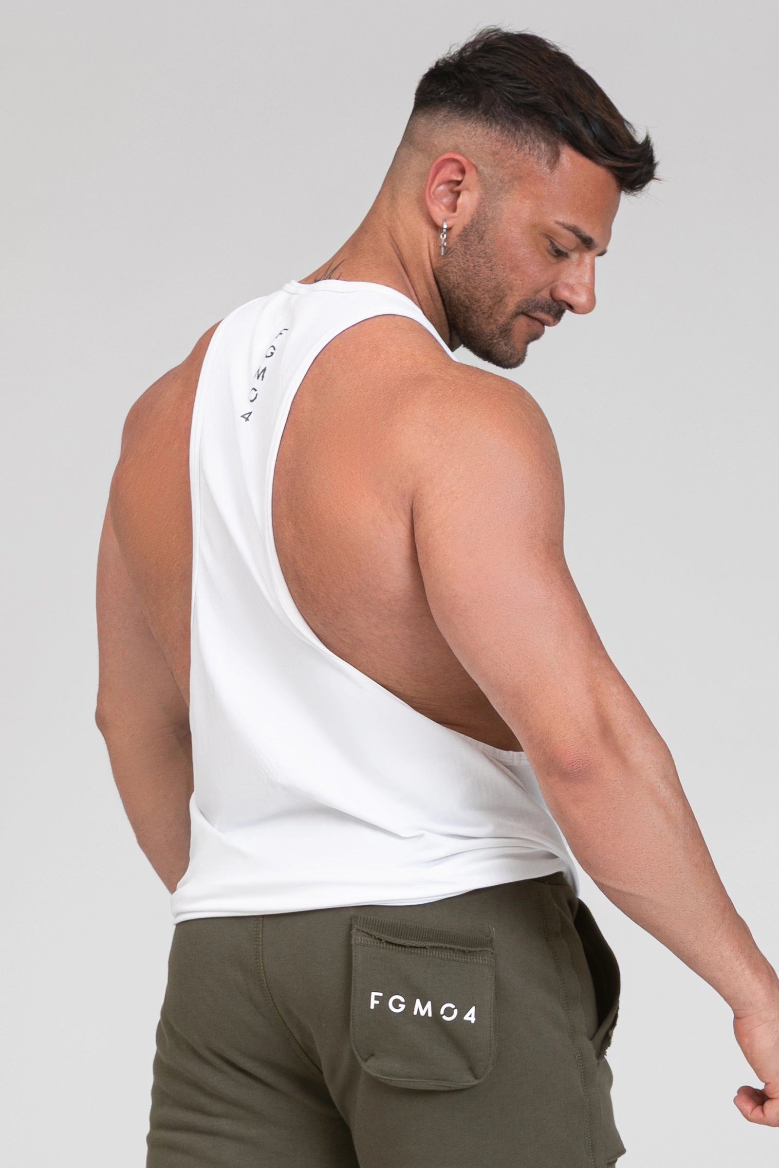 Abbigliamento sportivo tecnico palestra canotta traspirante anti odore Stringer Bianco - FGM04 - Linea Ikonic Uomo - fgm04